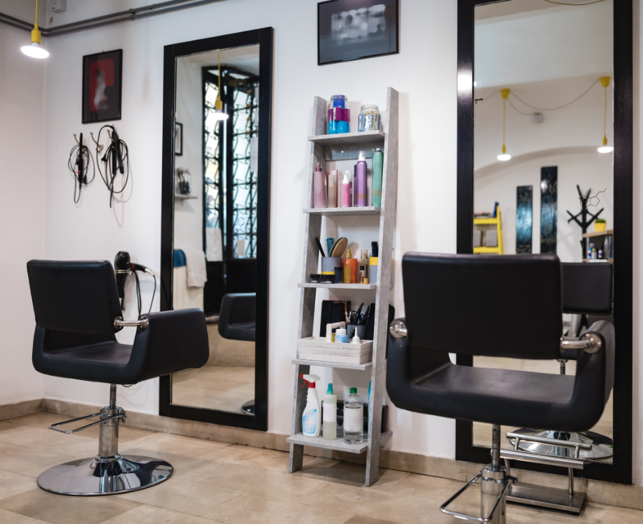 Interior of Othniel Hair Salon in St Pierre, Mauritius, showcasing modern styling stations, mirrors, and professional hairdressing tools